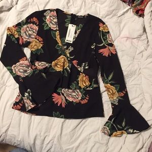 Cut out floral top w/ bell sleeves
